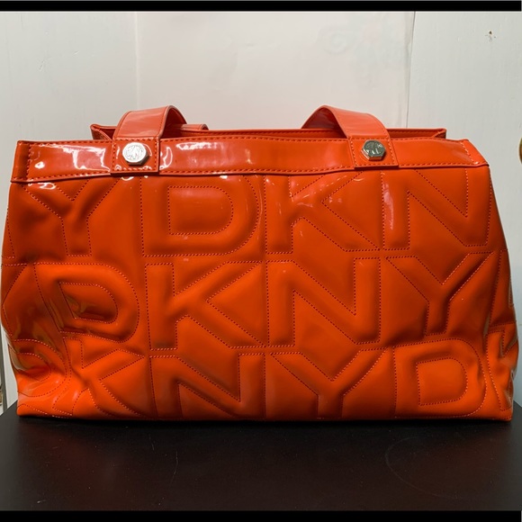 Dkny Handbags - DKNY overnight size orange puffer bag